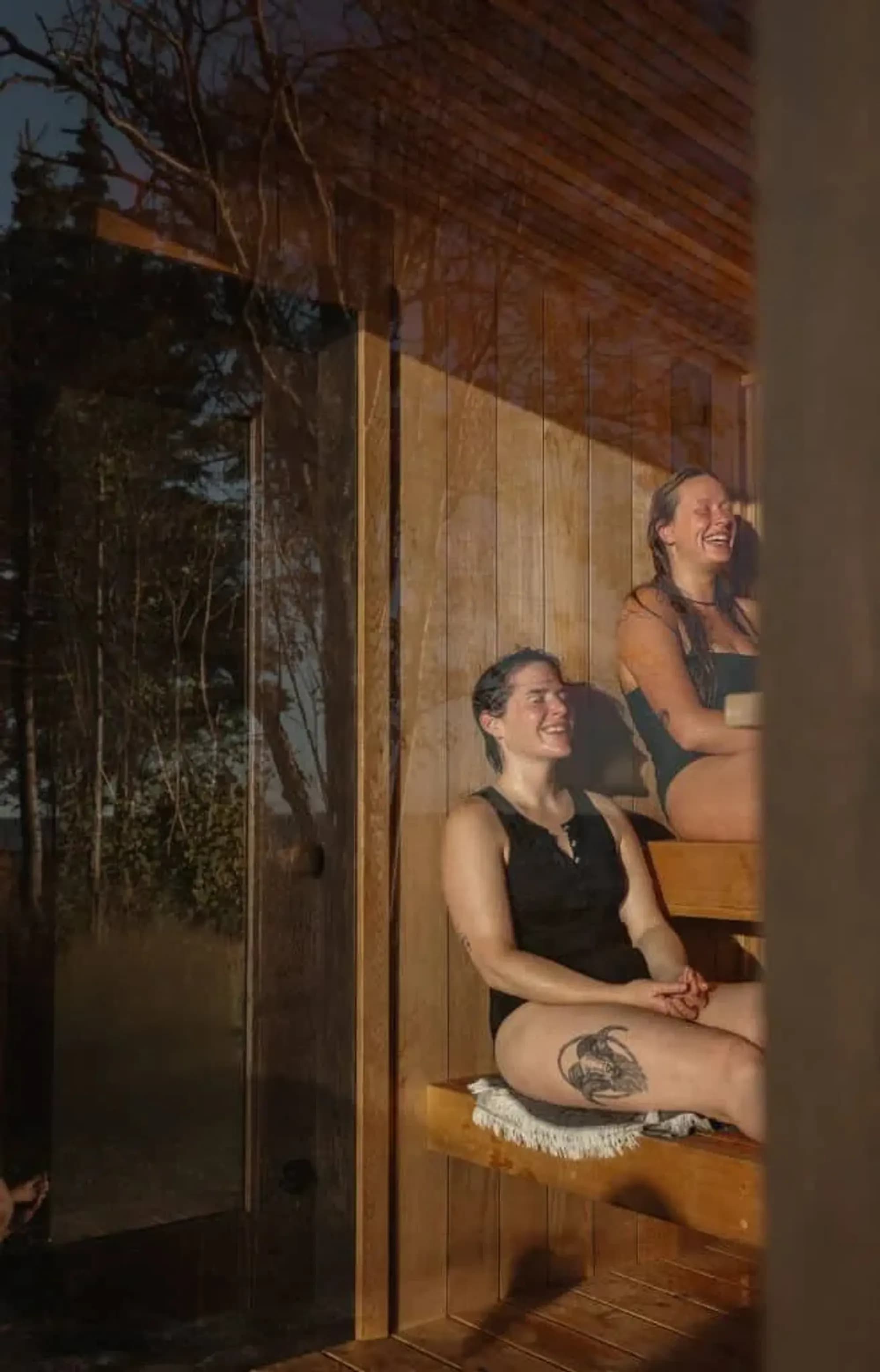 Friends relaxing in the social sauna