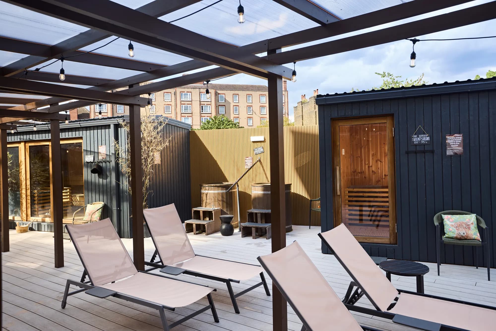 Sun loungers on the Kentish Town sauna village terrace